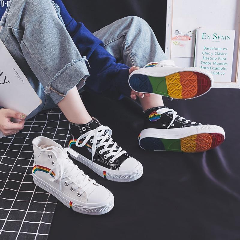 black and white classical high top converse style sneakers with a rainbow decoration in rainbow aesthetics fashion