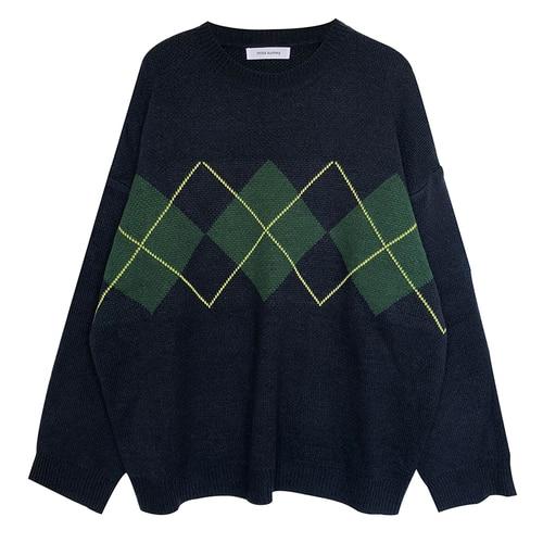 This casual cnitted pullover can and will be your go to sweater for your vintage clothing collection.