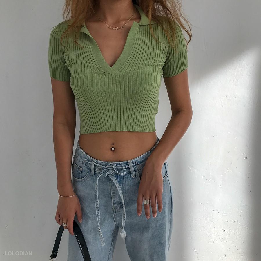 Light green Vintage ribbed women polo shirt crop top in vintage summer fashion with short sleeves solid and slim knit.