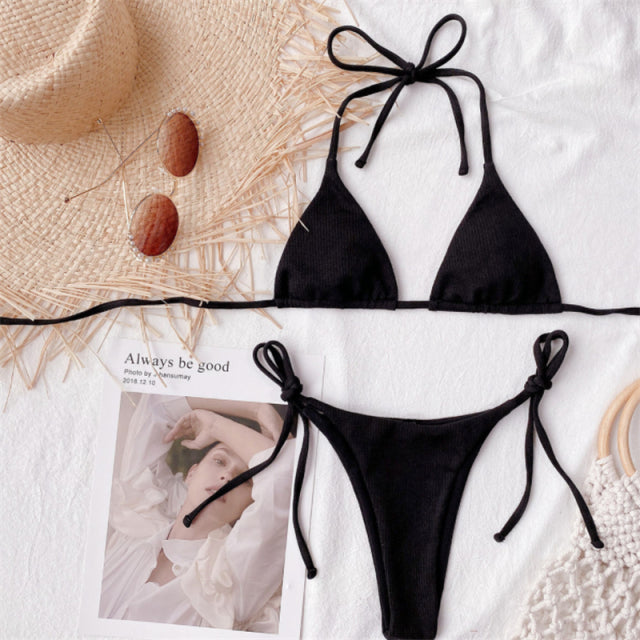 Aesthetics Soul is featuring the hottest Bikinis for the upcoming summer season. Find the solid triangle Bikini in black.