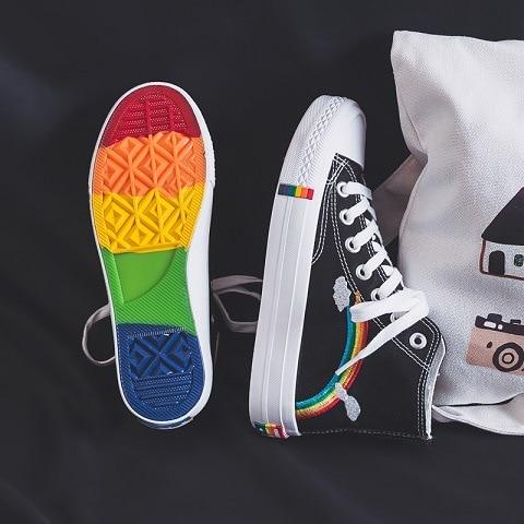 black classical high top converse style sneakers with a rainbow decoration in rainbow aesthetics fashion