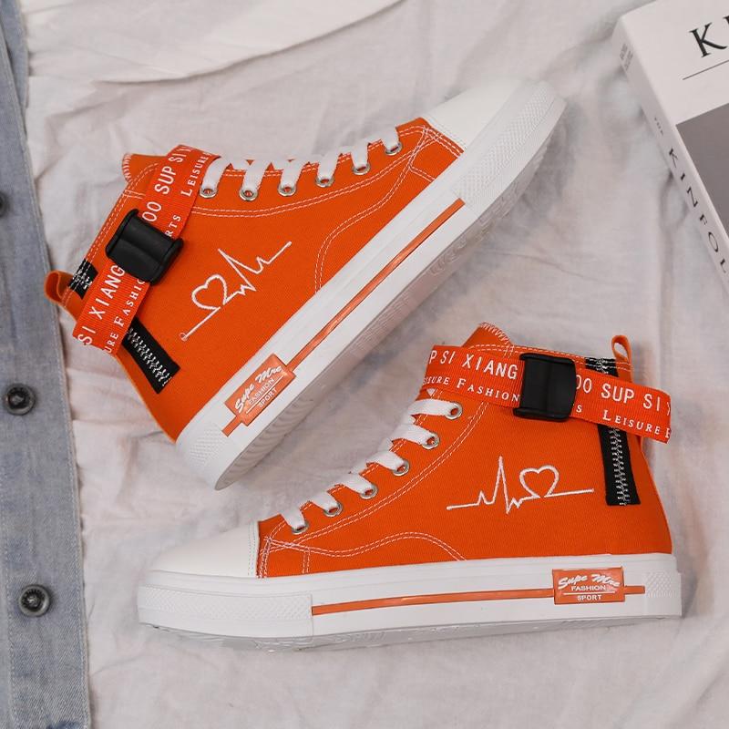 Orange high top Retro sneakers with embroidered heartbeat pulse