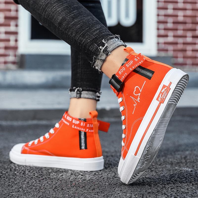 Orange high top Retro sneakers with embroidered heartbeat pulse
