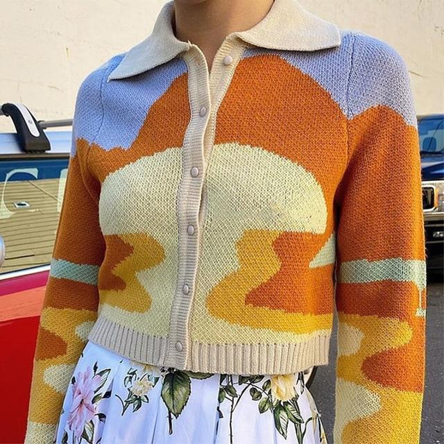 This sunset style cardigan sweater is the perfect outfit for your vintage clothing wardrobe. Explore our wide range of products for the best aesthetic shopping experience.